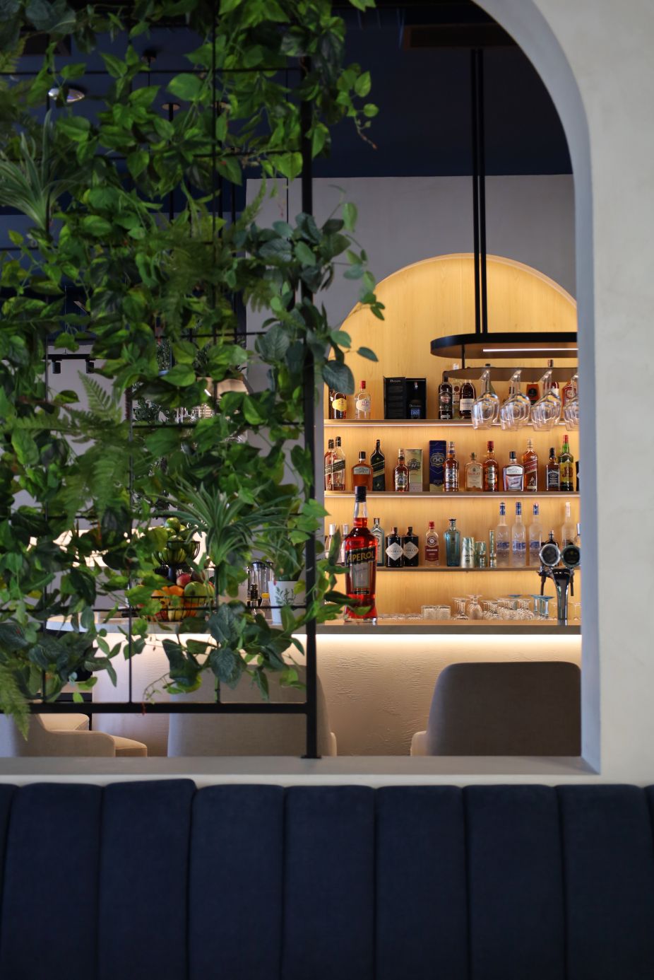 Restaurant interior through the arch